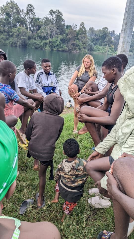 Coach Delia Stretches with Karongi Ishyakans